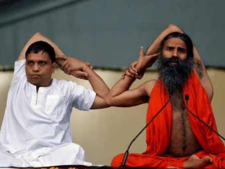 Baba Ramdev and Acharya Balkrishna doing Yoga